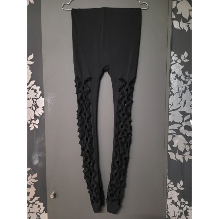 Legging troué noir (matière collante)